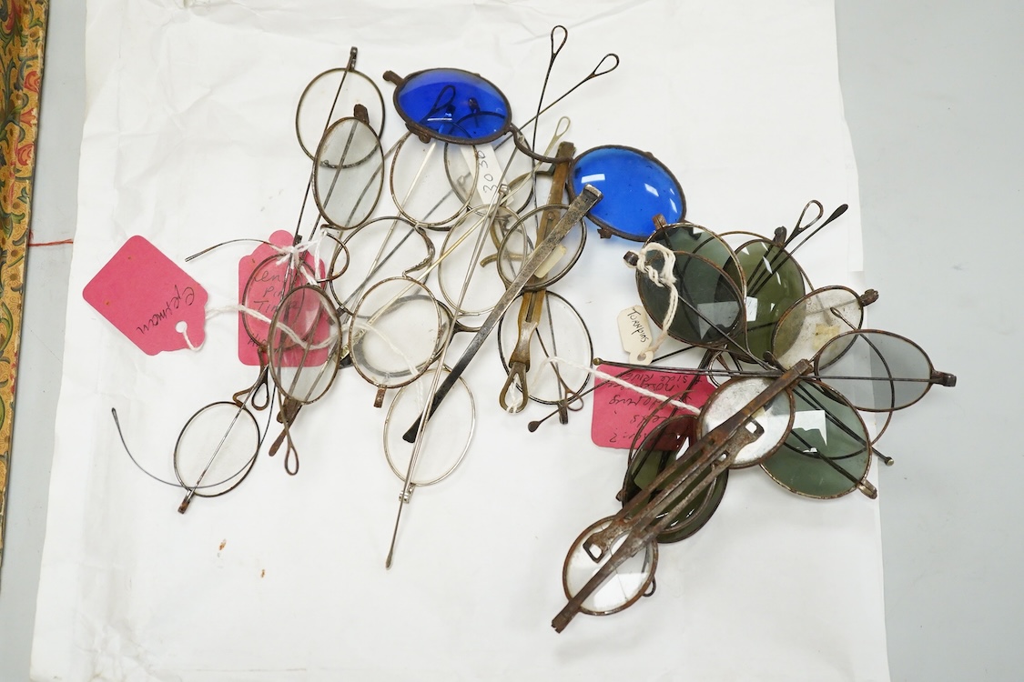 A large collection of 19th-century steel wire framed spectacles and a collection of 19th century leather, shagreen, embroidered etc. spectacle cases
